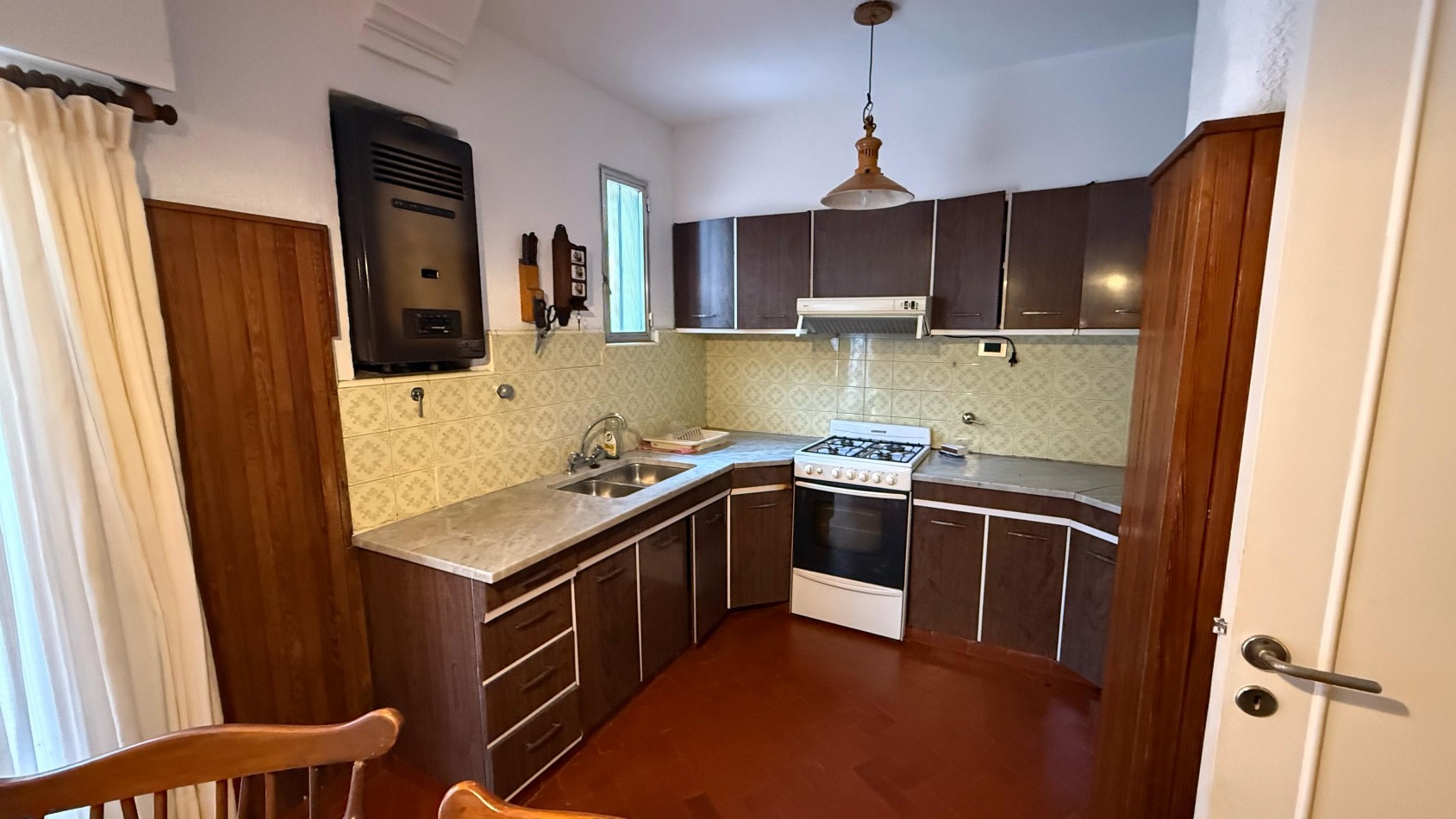 CASA PLANTA BAJA DE 2 o 3 DORMITORIOS Y PATIO